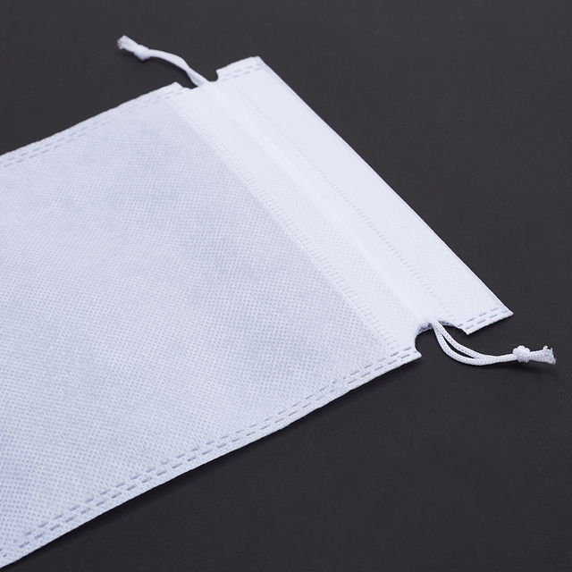 Customized Logo Eco Friendly Non Woven Fabric Dust Pouch Bags Drawstring Bag for Hotel Slipper